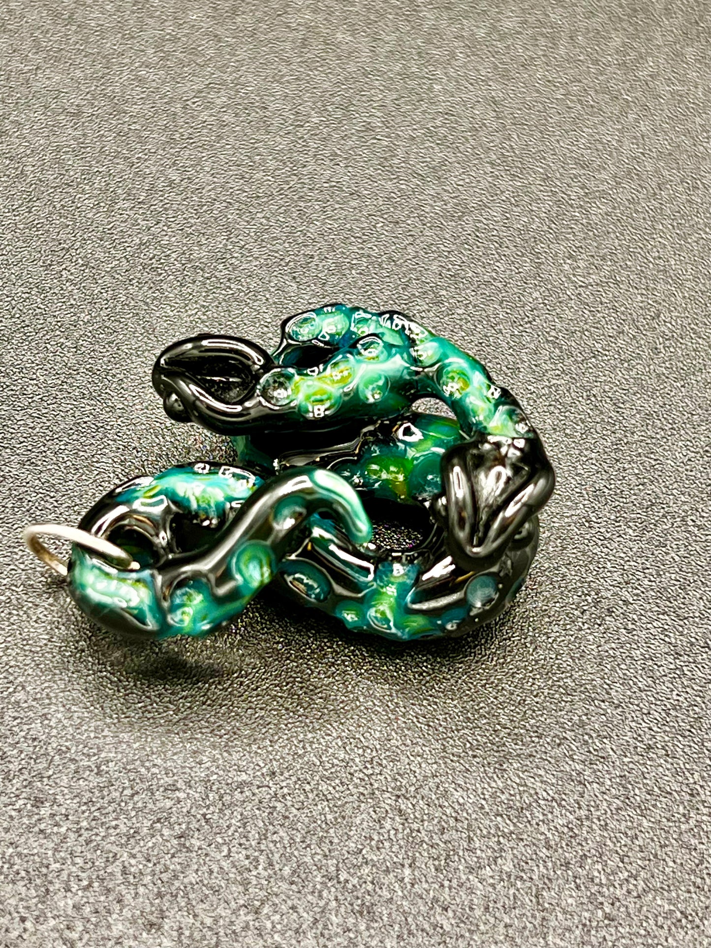 Gilyum Glass Cold Worked Python Pendant