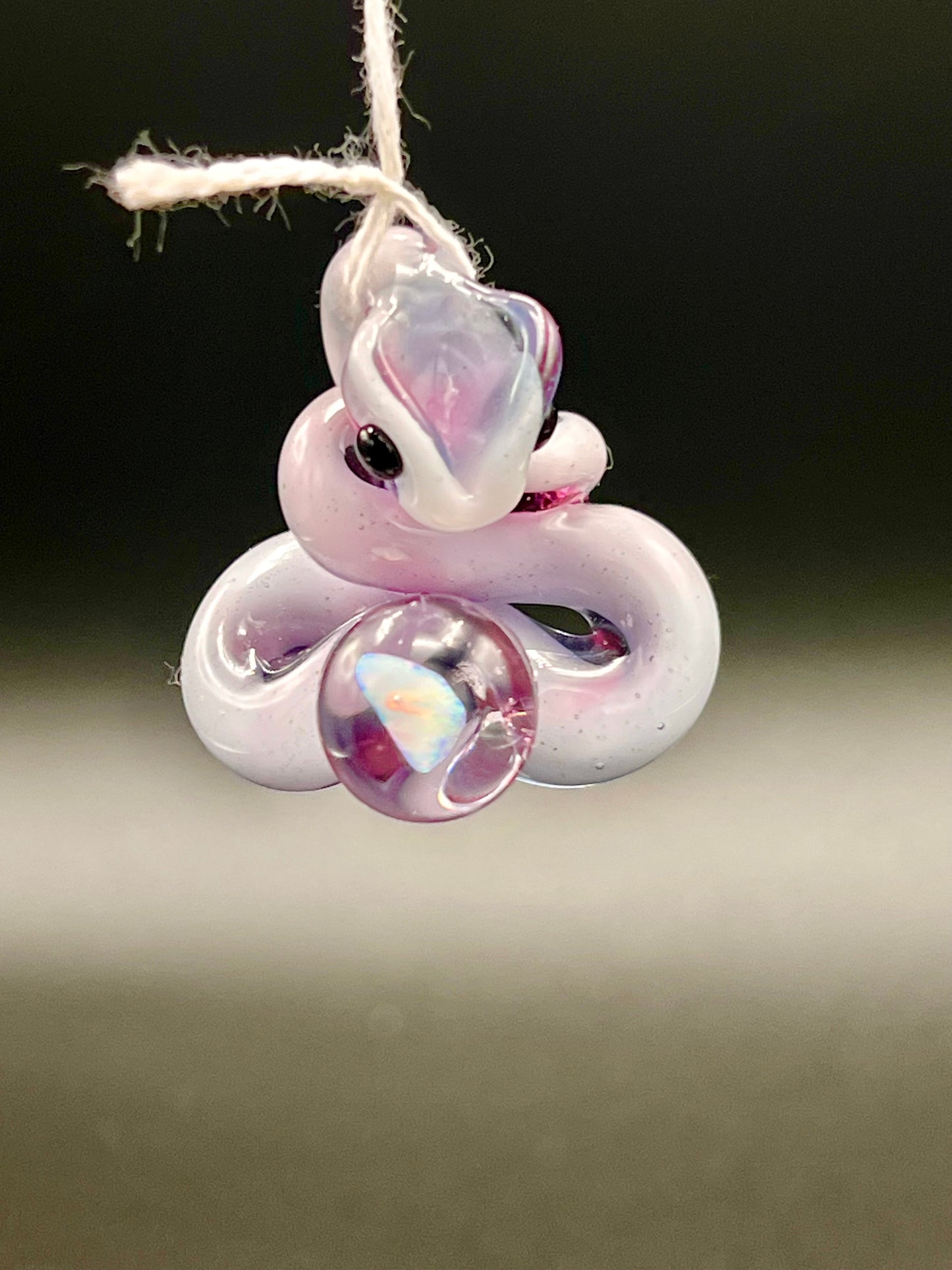 Gilyum Glass Opal Holding Python Pendant