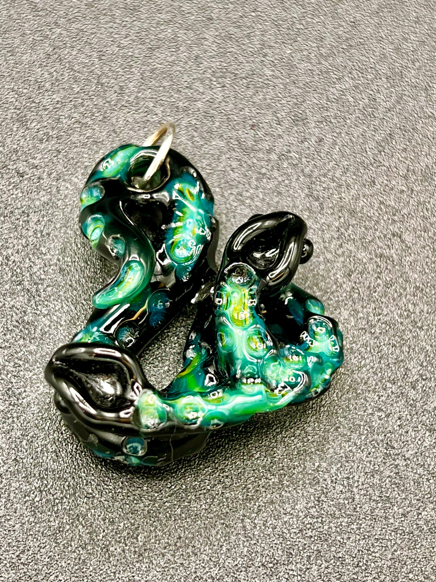 Gilyum Glass Cold Worked Python Pendant